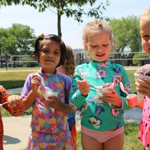 Children outside with snow cone
