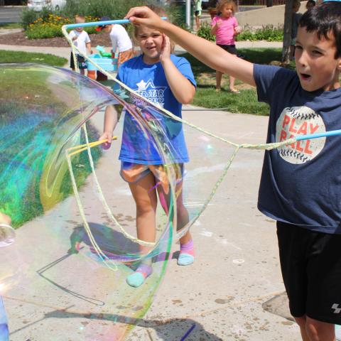 Child with large bubble 